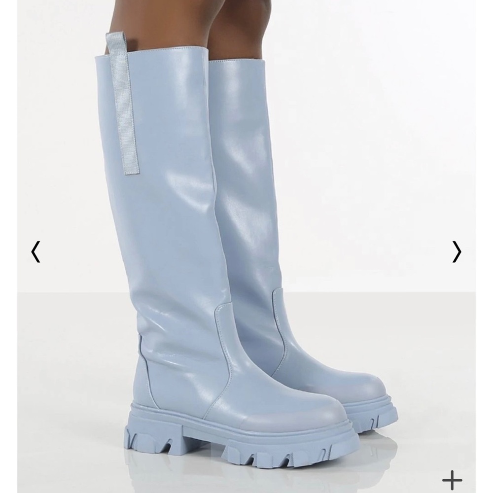 Knee high blue boots